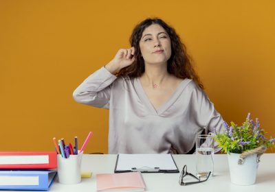 looking-side-thinking-young-pretty-female-office-worker-sitting-desk ???????????????????????????????????????????????????????????????????????????????????????????????????????????????????????????????????????????????